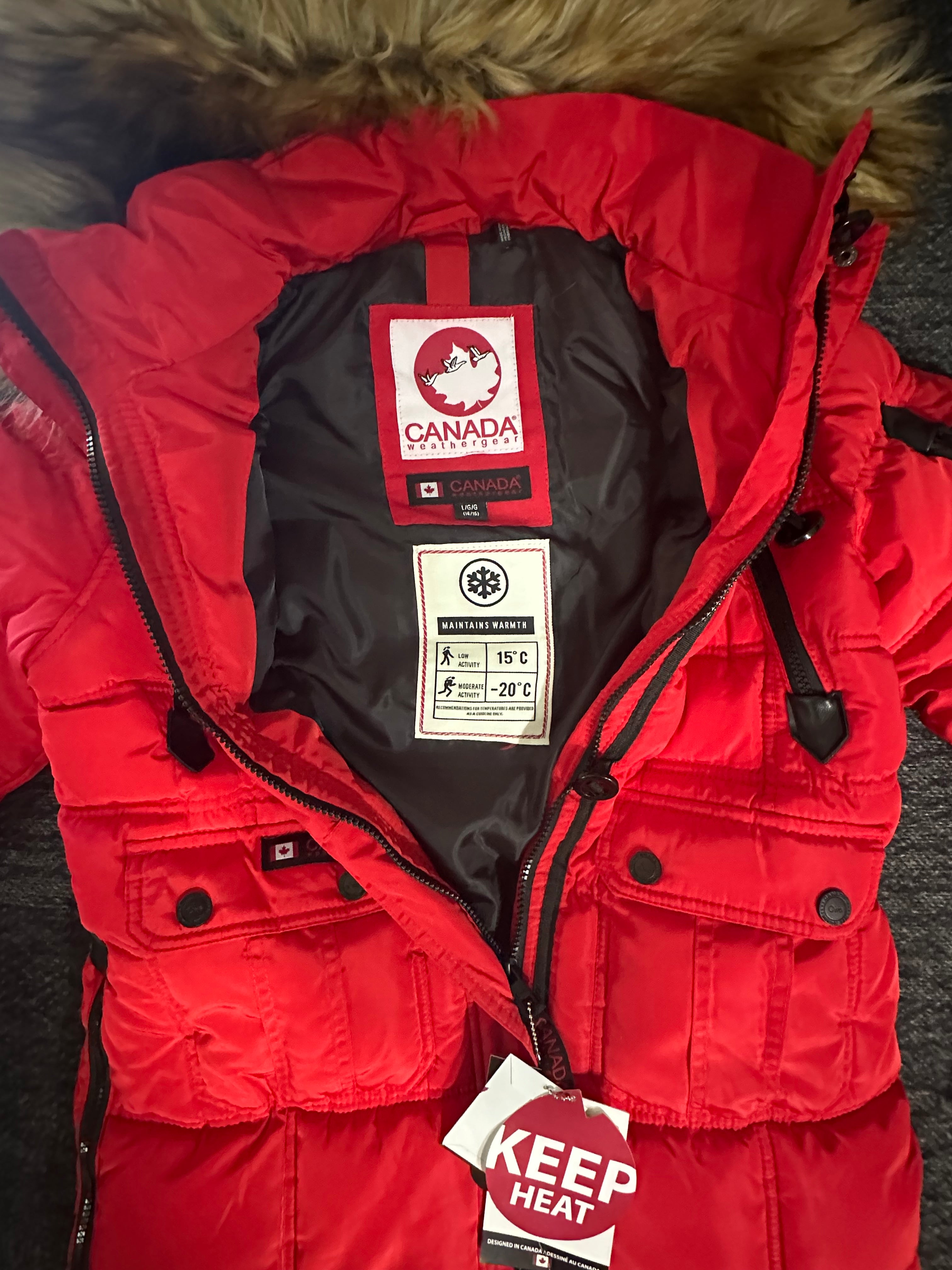 Canada weather gear girls red puffer winter parka in red color.
14/16 large size.