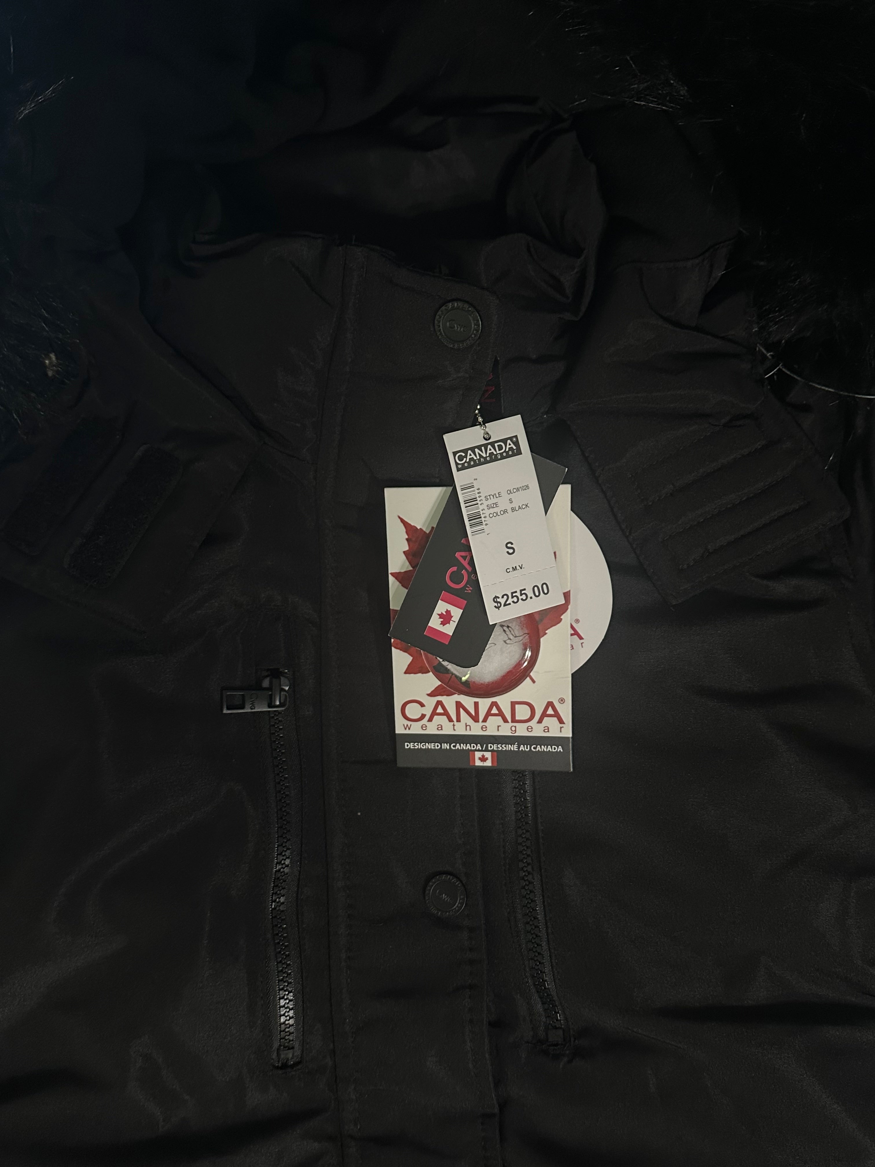 Canada weather gear women's fur hooded long line winter parka in small size in a black color. Black fur hood.