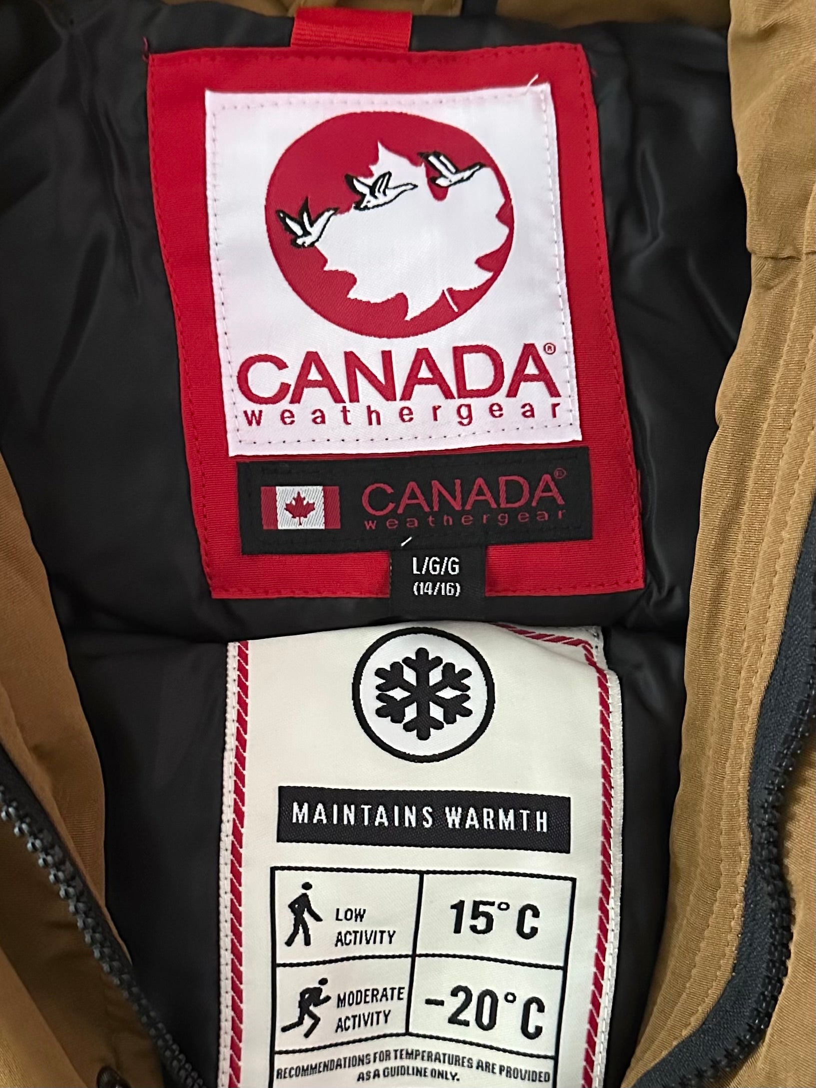 Canada weather gear boy's large 14/16 winter parka in oak color. With fur hood.