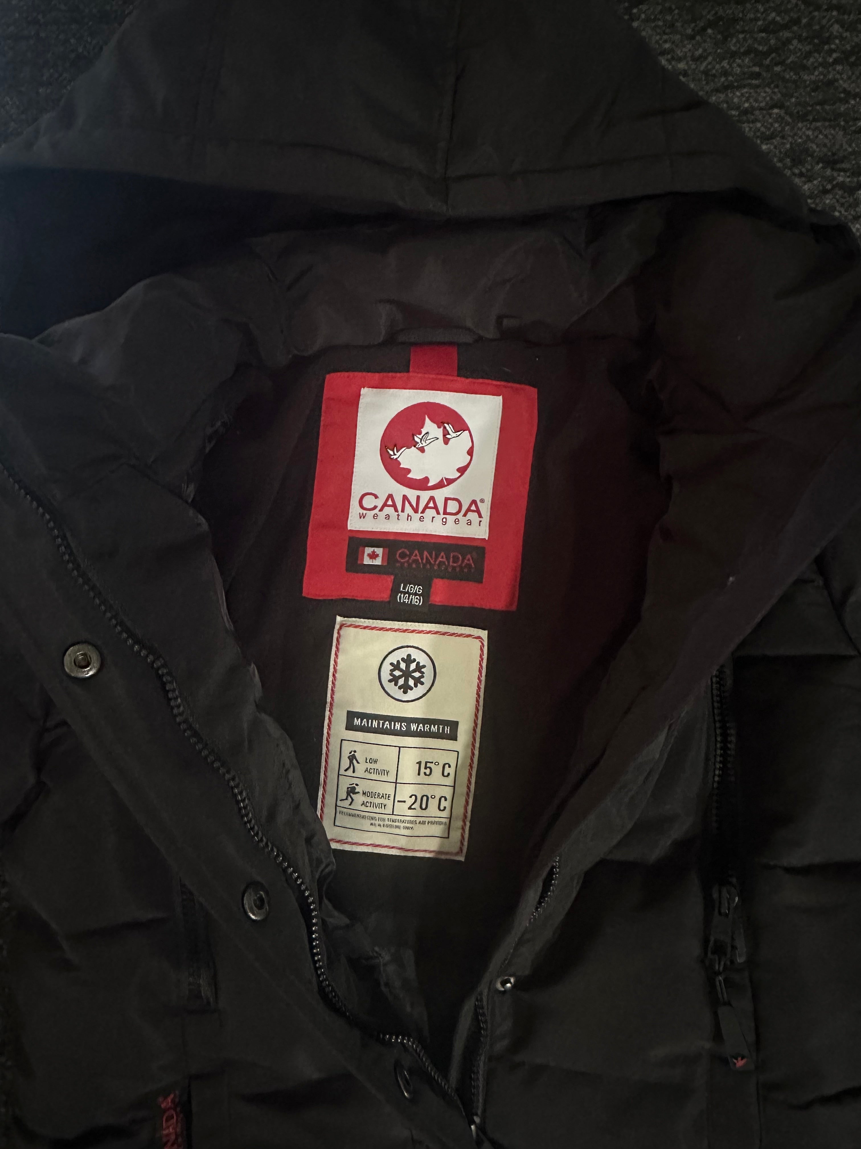 Canada weather gear girls large 14/16 stadium length quilted puffer parka in a black color.