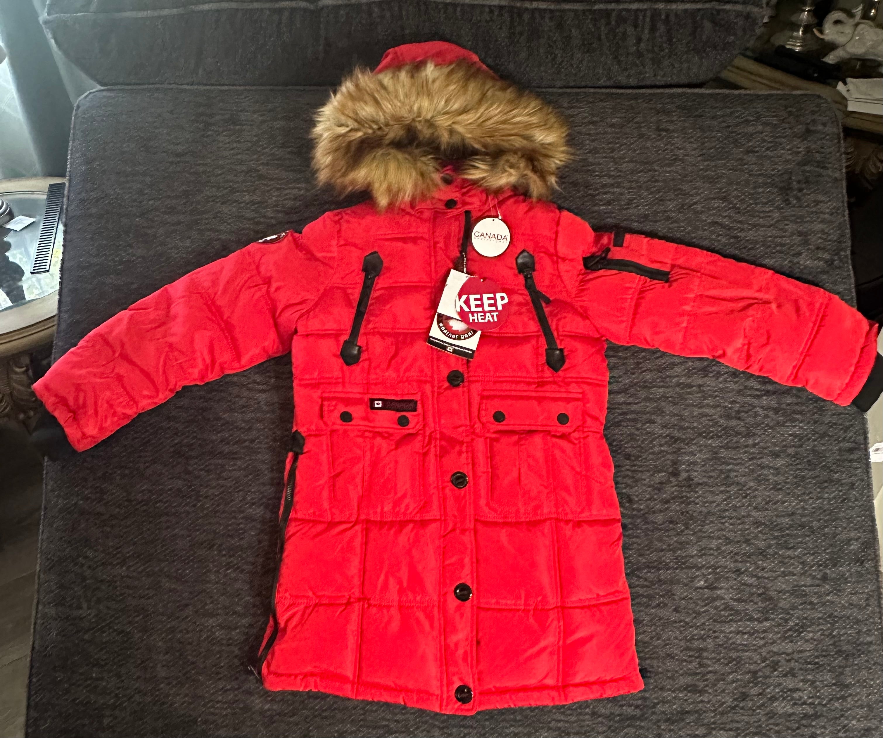 Canada weather gear girls red puffer winter parka in red color.
14/16 large size.