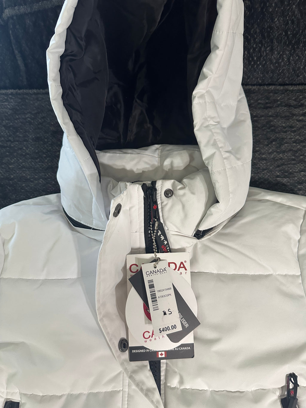 Canada weather gear women's extra long quilted maxi parka jacket. In small size. White color.