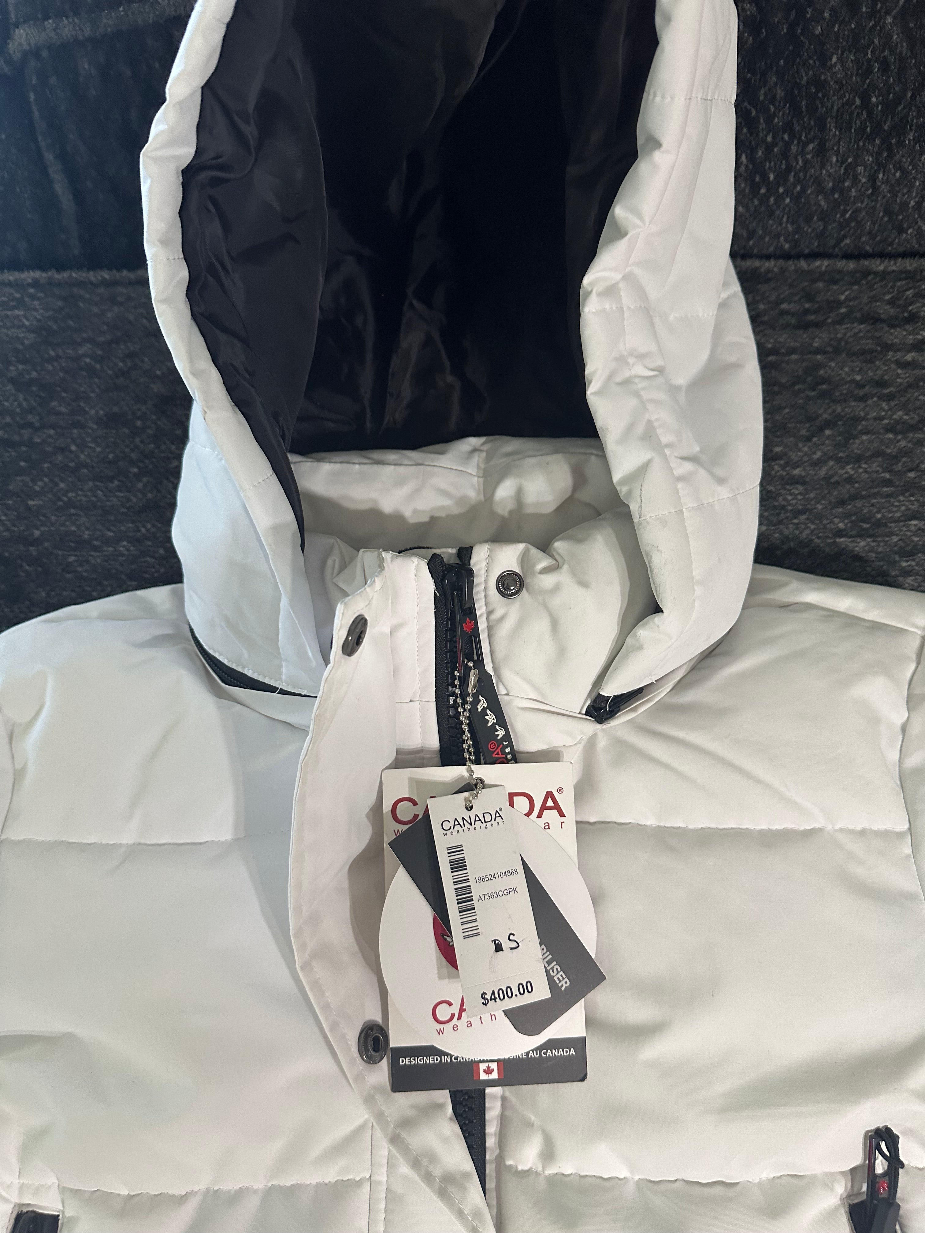Canada weather gear women's extra long quilted maxi parka jacket. In small size. White color.