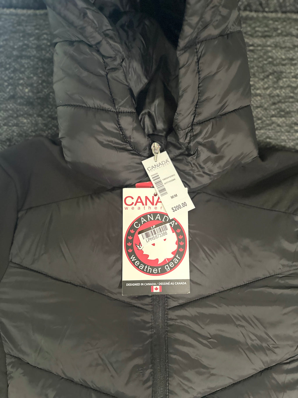 Canada weather gear women's hooded hybrid soft shell puffer jacket in black. Medium size.