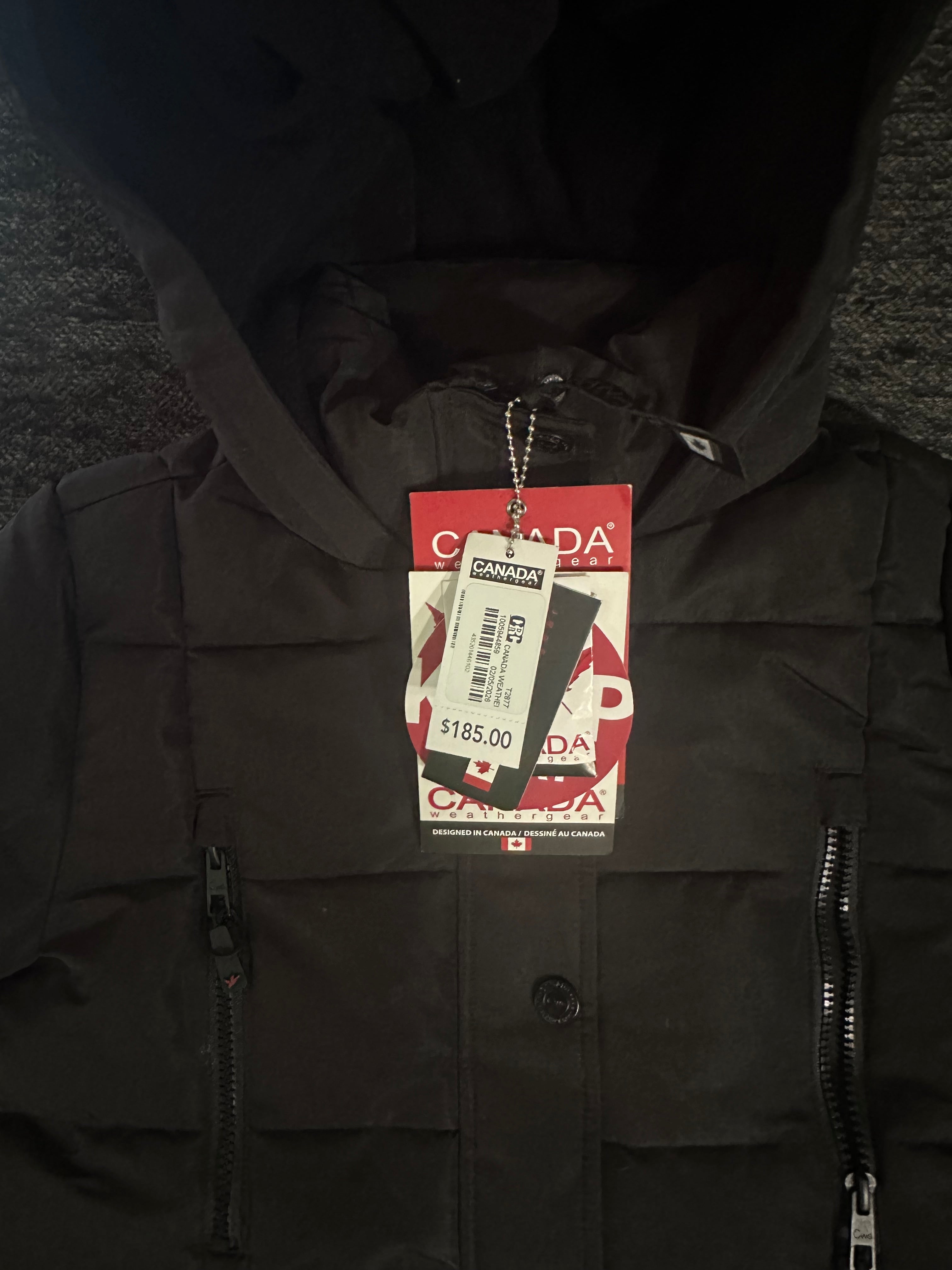 Canada weather gear girls large 14/16 stadium length quilted puffer parka in a black color.